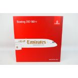 Gemini 200 - Emirates Store - A boxed 1:200 scale Boeing 7487-10 model in Emirates livery #