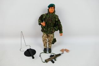 Palitoy - Action Man - An unboxed 1964 Action Man action figure with Flock hair and eagle eyes in