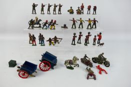 Britains - Johilco - Timpo - Benbros - A collection of metal figures including soldiers, cowboys,