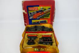 Brimtoy - Tin Plate - A tin plate clockwork train set.