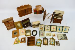 Doll Furniture - A collection of vintage dolls house items including wooden cabinets, a piano,