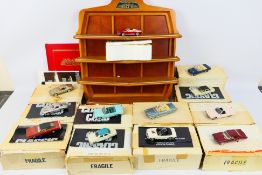 Franklin Mint - A set of 12 x boxed models from Franklin Mint's Cars Of The Sixties complete with