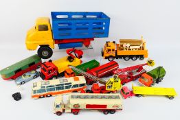 Dinky - Matchbox - Corgi - Triang - A collection of unboxed vehicles in varying sizes in worn