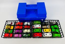 Matchbox - A plastic Matchbox carry case containing 24 Matchbox diecast model cars from various