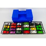 Matchbox - A plastic Matchbox carry case containing 24 Matchbox diecast model cars from various