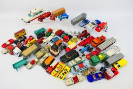 Dinky - Matchbox - Corgi - A collection in excess of 40 unboxed die-cast vehicles in varying sizes