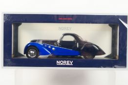 Norev - A boxed 1:18 scale Limited Edition Norev #184696 Peugeot 302 Darl' Mat Coupe.