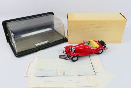 Franklin Mint - A 1935 Mercedes Benz 500K roadster with display case.