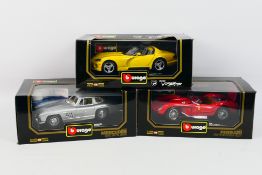 Bburago - Three boxed diecast 1:18 scale model cars from Bburago.