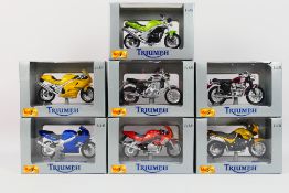 Maisto - Seven boxed Maisto 1:18 scale diecast Triumph motorcycles.