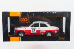 IXO Models - A boxed 1:18 scale IXO Models #18RMC024A Ford Escort Mk.I RS1600 #12 'H.Mikkola / G.