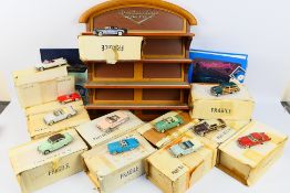 Franklin Mint - A set of 12 x boxed models from Franklin Mint's Cars Of The Fifties complete with