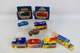 Matchbox - An boxed and unboxed collection of Matchbox diecast vehicles, plus an EMPTY box.