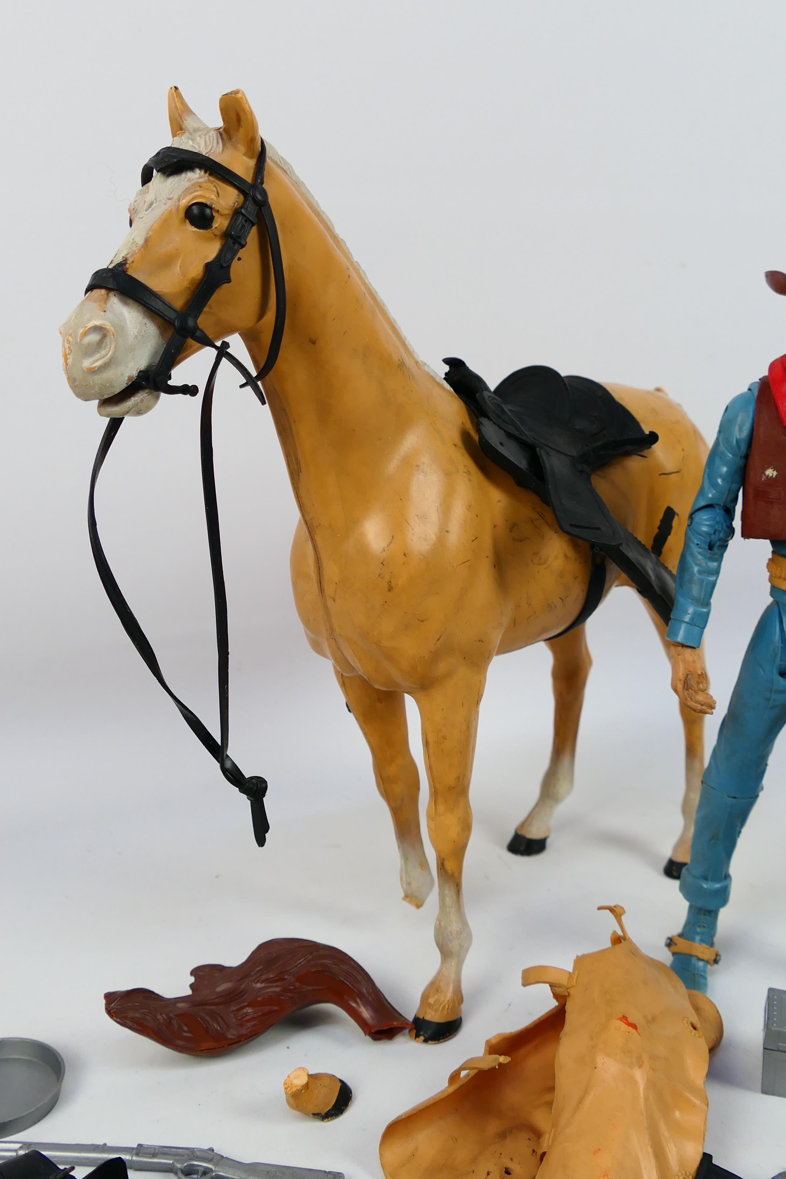 Johnny West - An unboxed vintage Johnny West Cowboy Kit comprising of a 12" cowboy poseable action - Image 3 of 7