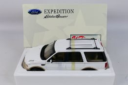 UT Models - A boxed UT Models #727651 'Eddie Bauer' Ford Expedition.