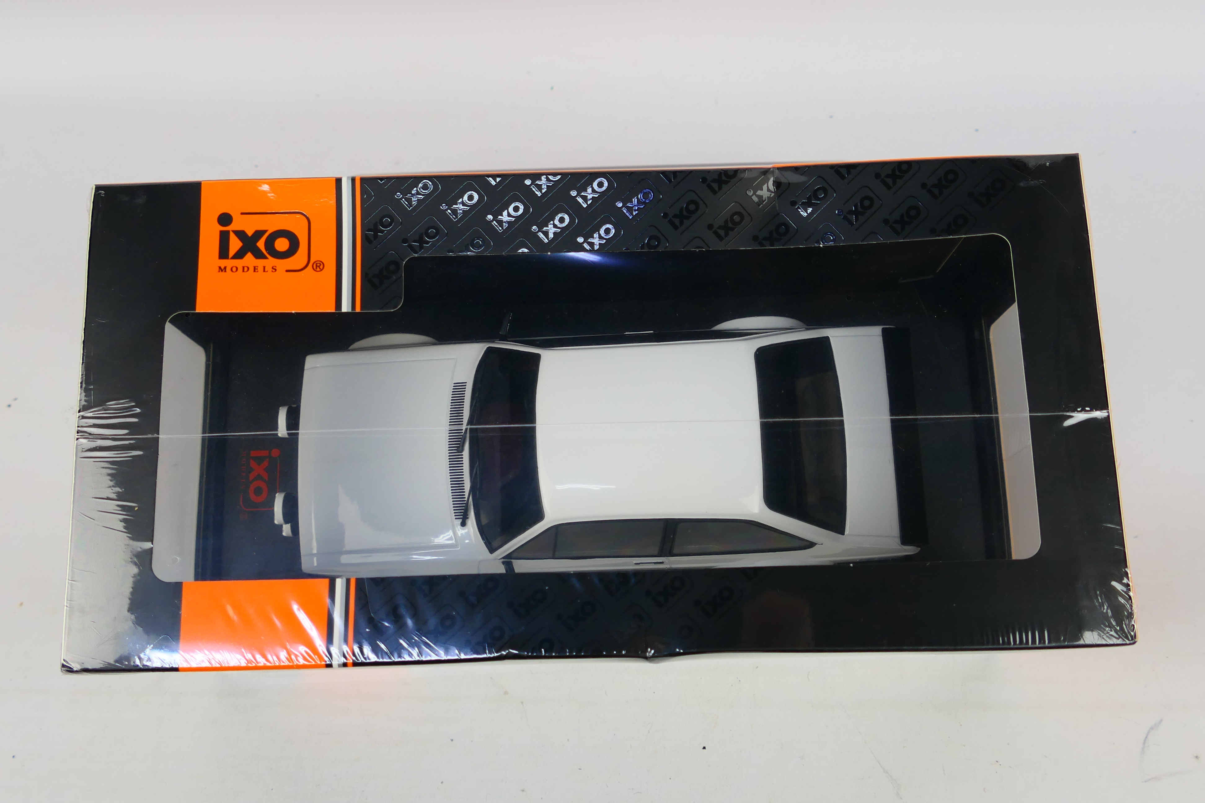 IXO Models - A boxed 1:18 scale IXO Models #18CMC029 1977 Ford Escort MK.II RS1800. - Image 5 of 5