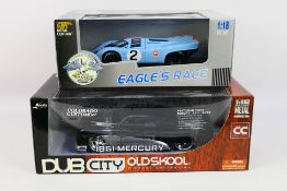 Jada - Two boxed diecast 1:18 scale model cars.