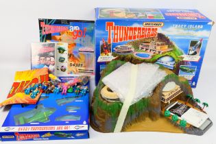 Matchbox - Thunderbirds - A boxed Tracy Island, a Rescue Pack, a 9 disc DVD set, a sticker sheet,