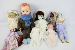 Pedigree - Other - A group of porcelain dolls and a vintage Pedigree large plastic doll.