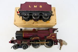 Hornby - A clockwork O gauge 4-4-0 LMS Compound locomotive and tender number 1185 # E220.