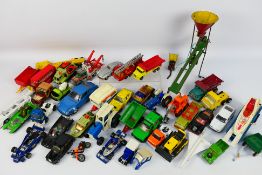 Dinky Toys - Matchbox - Corgi - Others - A group of playworn diecast and tinplate models in several