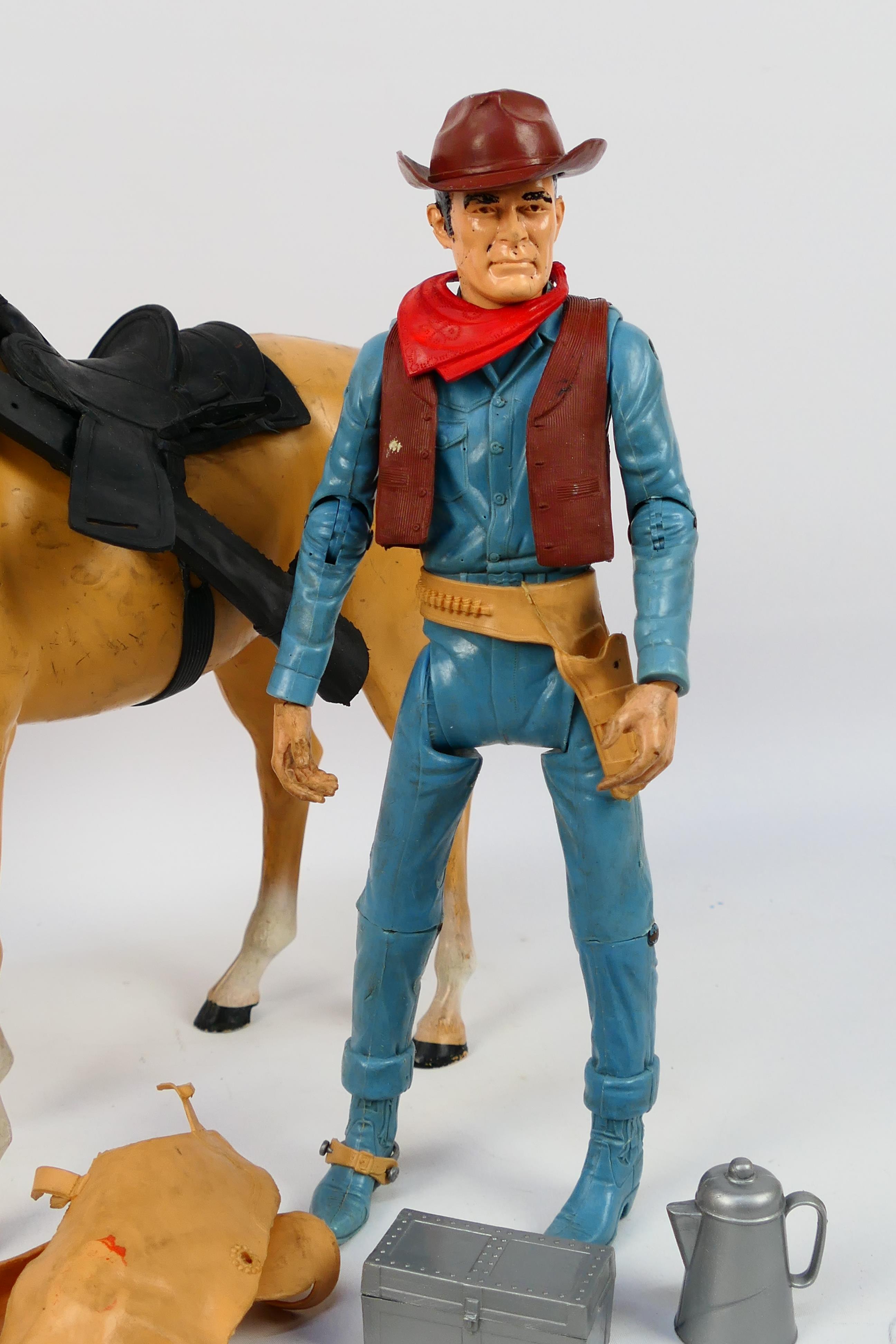 Johnny West - An unboxed vintage Johnny West Cowboy Kit comprising of a 12" cowboy poseable action - Image 2 of 7