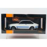 IXO Models - A boxed 1:18 scale IXO Models #18CMC029 1977 Ford Escort MK.II RS1800.