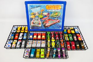 Matchbox - A 1975 Matchbox carry case containing 48 Matchbox diecast model cars from various ranges.