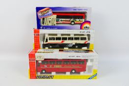 Joal - Siku - Three boxed diecast model buses in various scales.