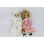 Unknown Maker - Porcelaine - Dolls - A pair of unboxed porcelain dolls in excellent condition.