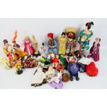 Unknown Maker - A collection of dolls in national costume, some composite,