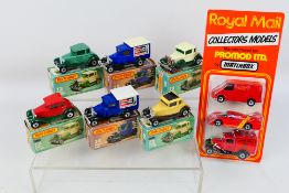 Matchbox - A collection of seven boxed / carded Matchbox diecast vehicles,