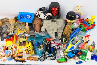 Kenner - Hasbro - Galoob - Tyco - Others - An assortment of unboxed vintage action figures and toys.