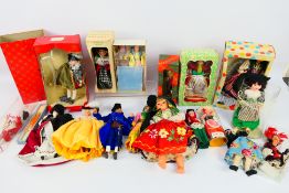Peggy Nisbet - Myfanwy - Muster - A collection of over 15 mixed plastic dolls.