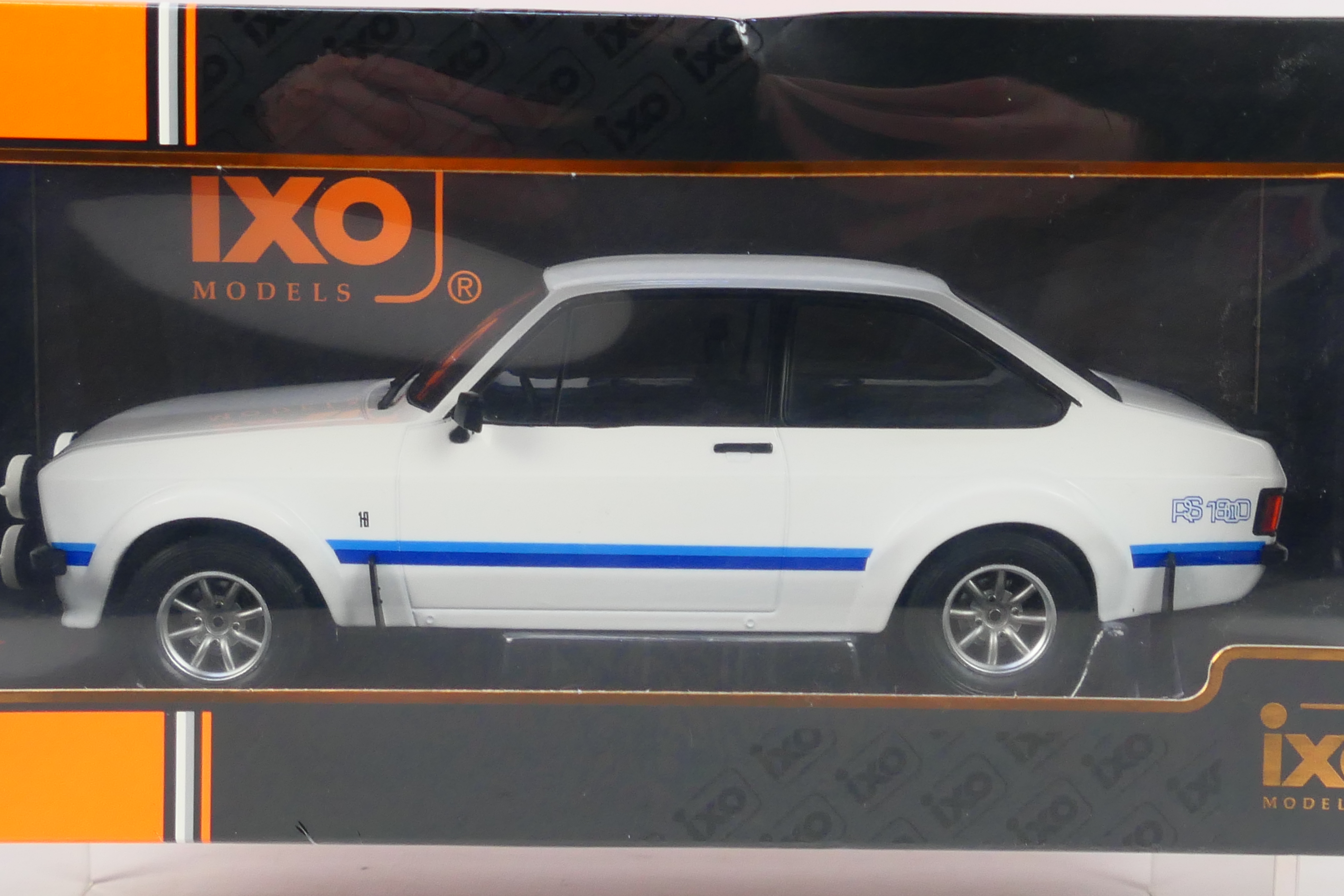 IXO Models - A boxed 1:18 scale IXO Models #18CMC029 1977 Ford Escort MK.II RS1800. - Image 2 of 5