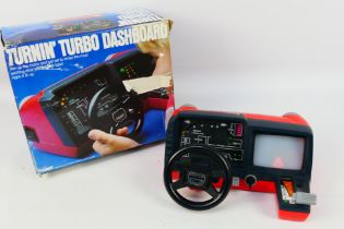 Tomy - A boxed vintage Turnin Turbo Dashboard # 7057.