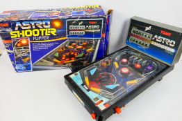 Tomy - A boxed vintage Astro Shooter Pinball electronic game # 7024.