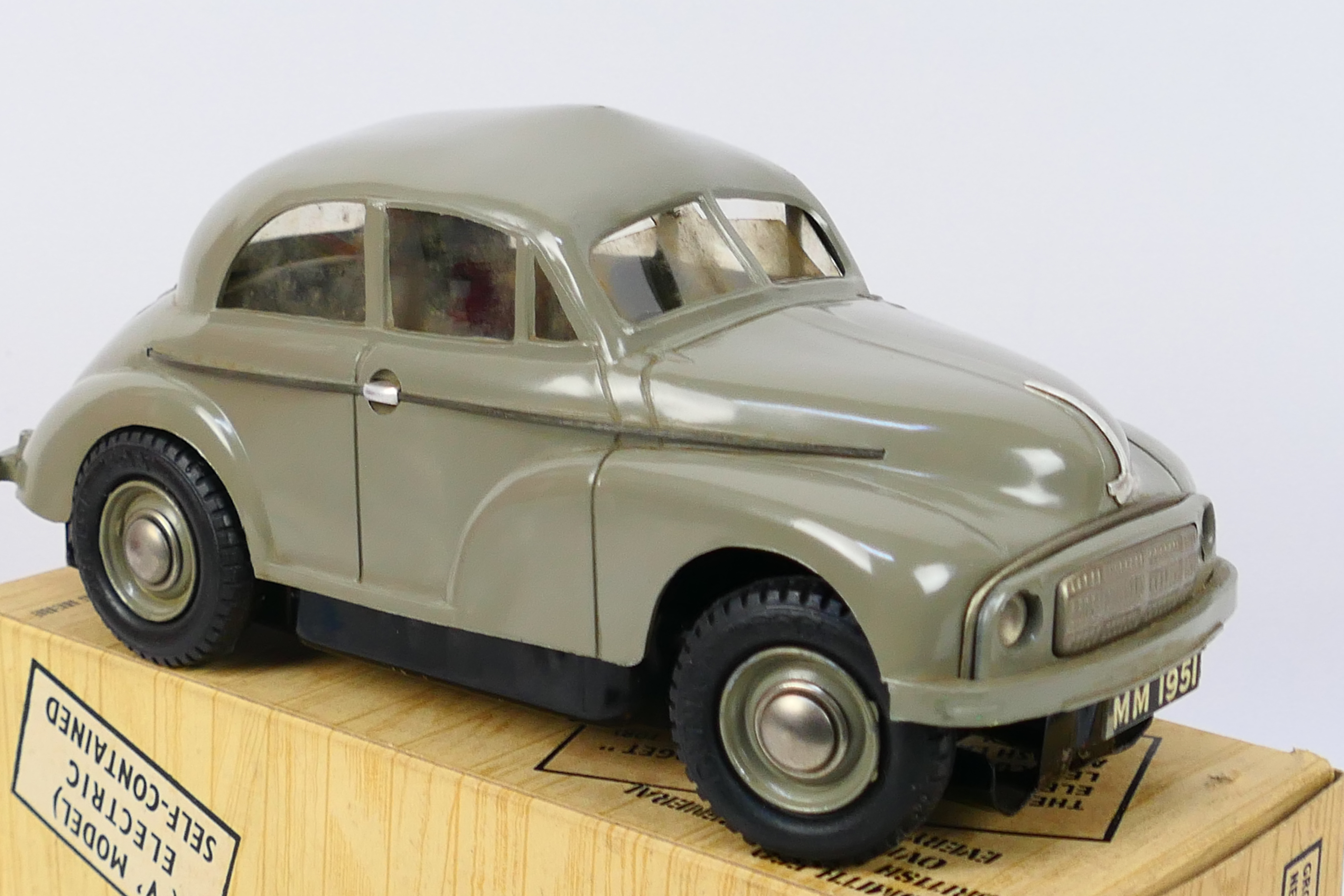 Victory Industries - A boxed motorised V Model Morris Minor low light model in grey. - Image 6 of 7