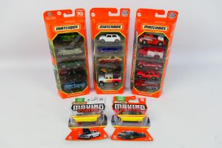 Matchbox - Three multi-packs of diecast matchbox cars each containing five vehicles in near-mint