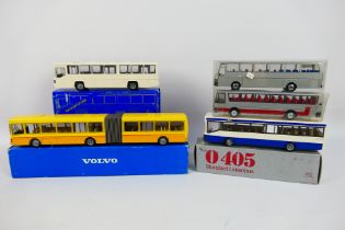 NZG - Cursor - Five boxed European diecast model buses in various scales.