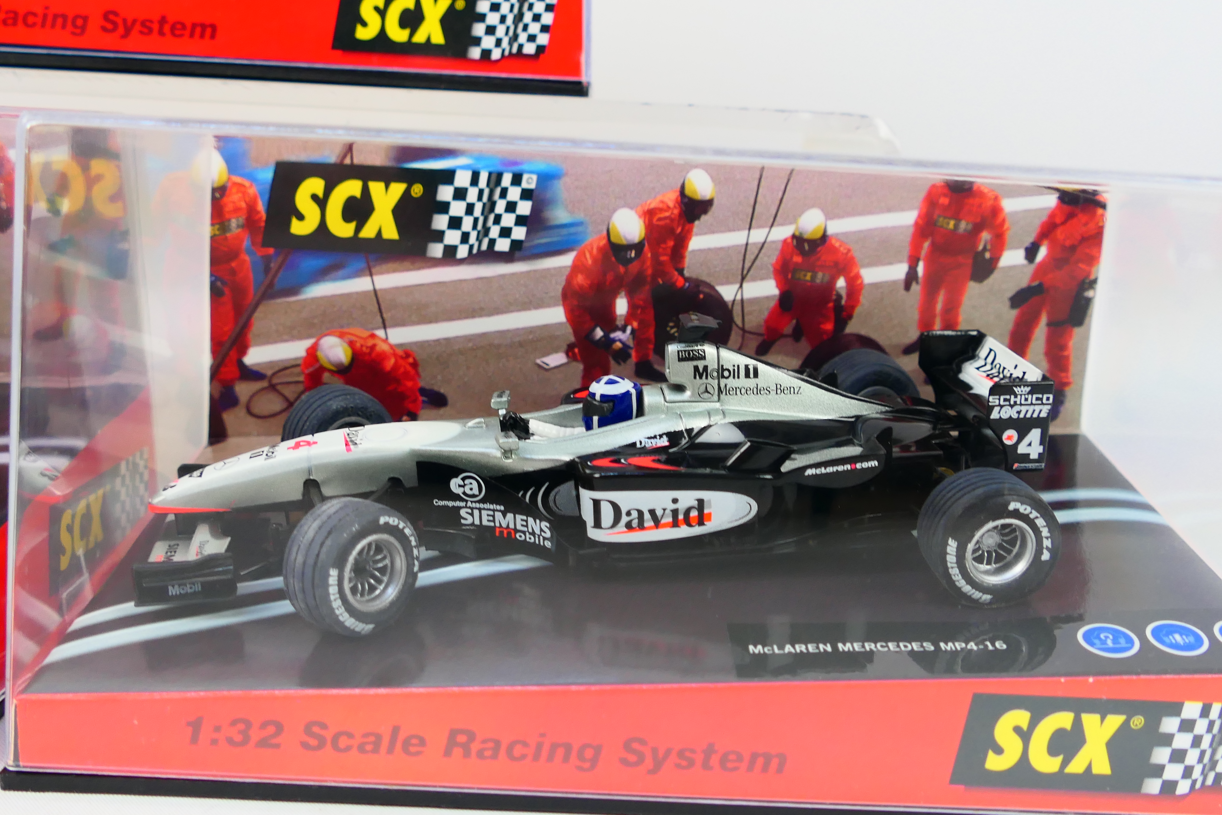 SCX - Three boxed 1:32 scale F1 slot cars. - Image 4 of 4