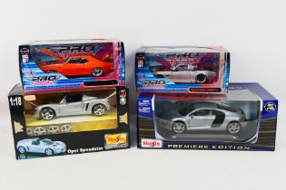 Maisto - Four boxed Maisto diecast model cars in 1:18 & 1:24 scales.