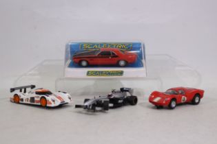 Scalextric - 4 x slot cars, a Dodge Challenger in an unmarked box, a Ferrari P4,