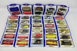 Oxford Diecast - A collection of 40 Oxford Diecast Metal vehicles including busses with adverts: