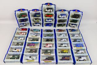 Oxford Diecast - A collection of 46 Oxford Diecast Metal vehicles including Mackintosh's Quality
