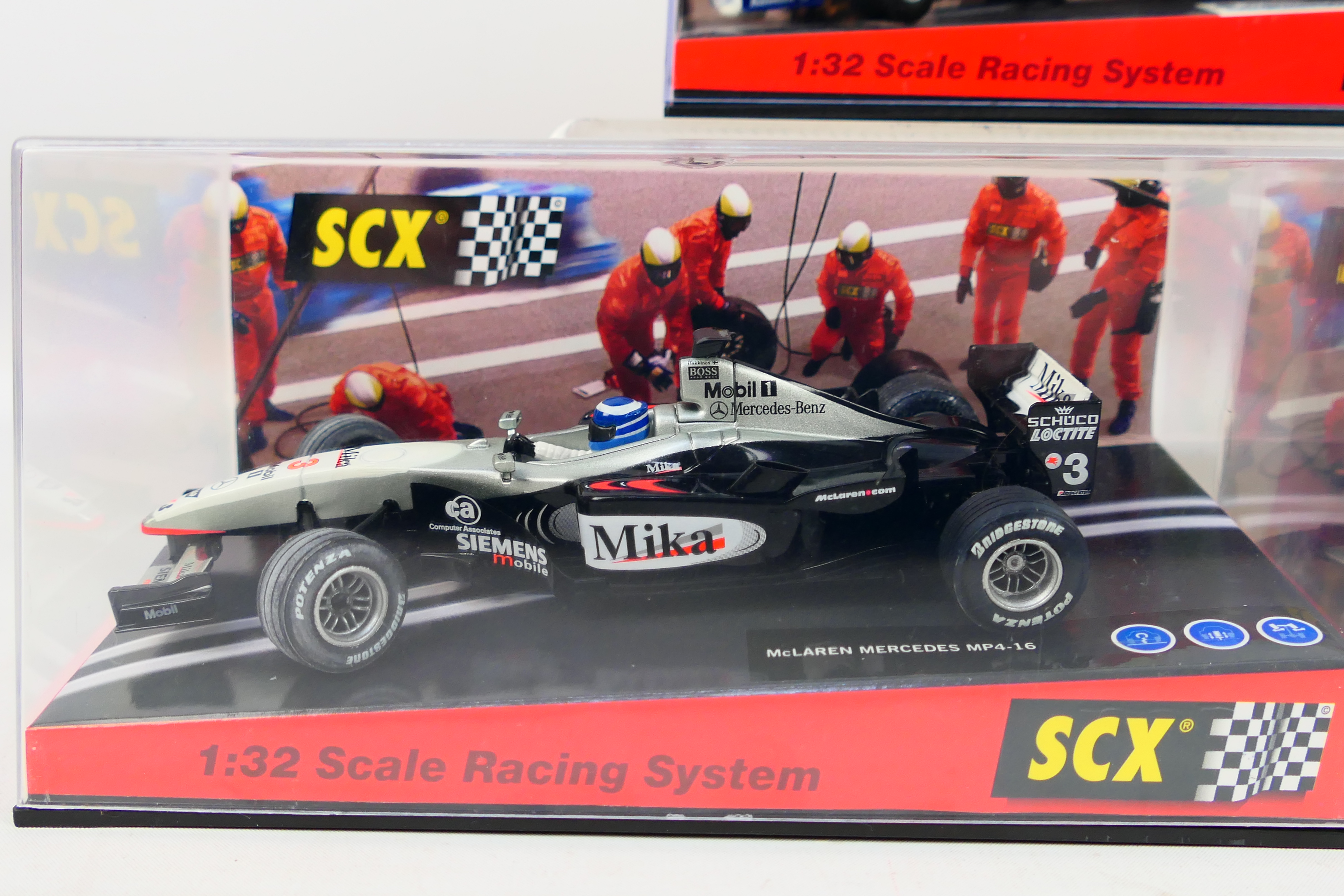 SCX - Three boxed 1:32 scale F1 slot cars. - Image 3 of 4