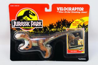 Kenner - Jurassic Park - A 1993 Blister packed figure of Velociraptor from Jurassic Park.