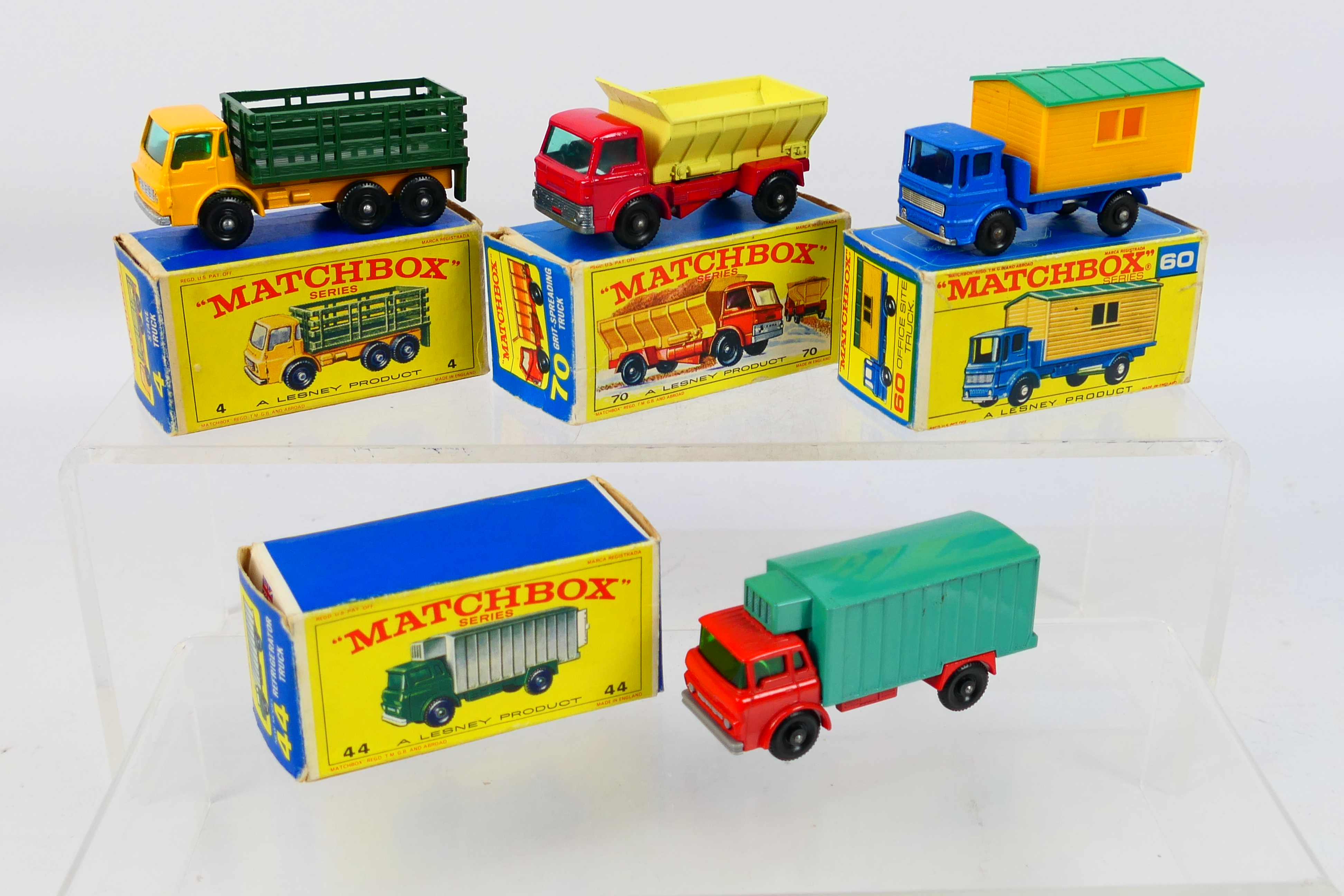 Matchbox - 4 x boxed models, Dodge Stake Truck # 4, GMC Refrigerator Truck # 44,