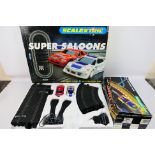 Scalextric - Hornby - A Super Saloons Scalextric set (#C1016) and Track extension pack B (#C8035).