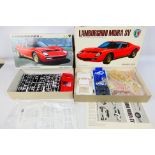 Fujimi - Hasegawa - Two boxed vintage Lamborghini plastic model car kits.